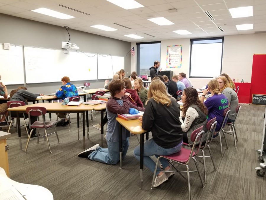 IS THIS COLLEGE?- Does this look like an ordinary college class? It does not look like it, but it is actually the college Academic Writing class taught at the high school. All the college classes taught at the high school have a college atmosphere, but still having the high school benefits. 