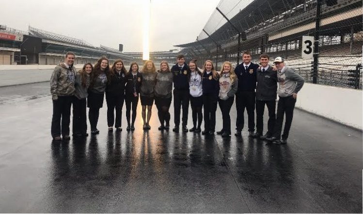 New Ulm FFA members standing on the Indy speedway