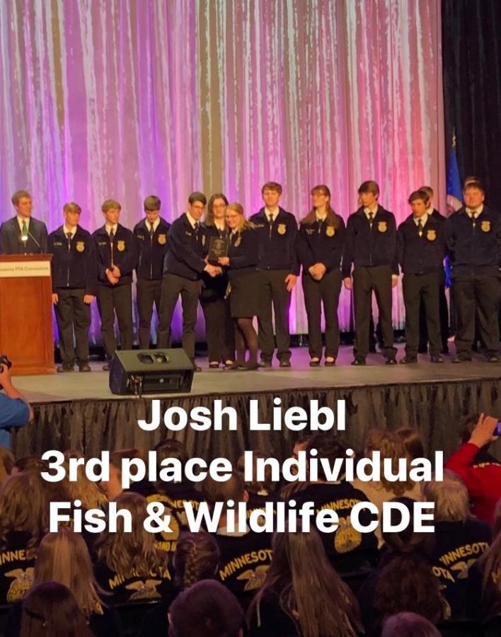 Josh Liebl receiving his plaque for placing 3rd in the state for the Fish & Wildlife CDE competition 