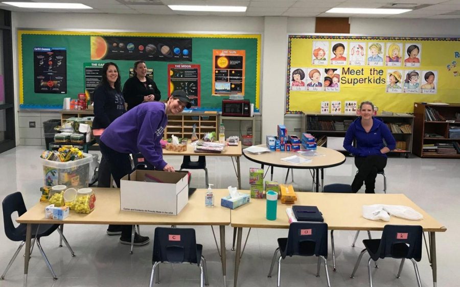 Teachers preparing supplies for distance learning