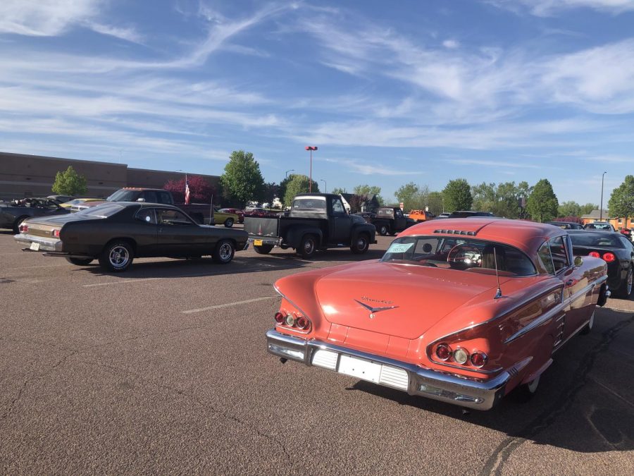 Unifying the community while social distancing with a drive by car show