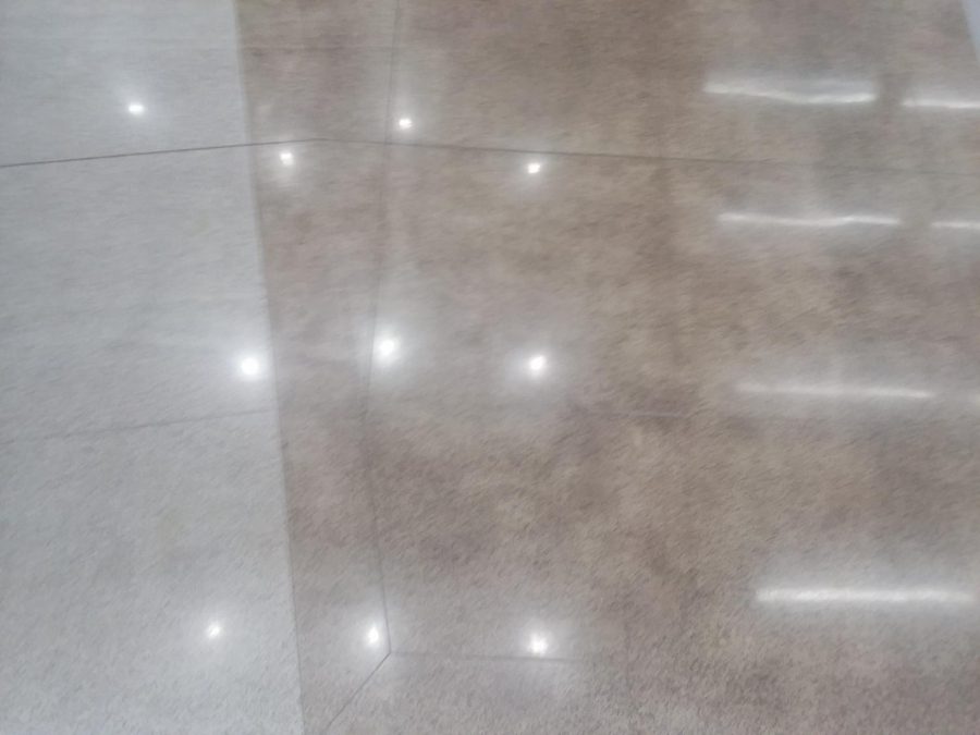 The floor at New Ulm High School reflects light from the ceiling, making it look pretty nice.