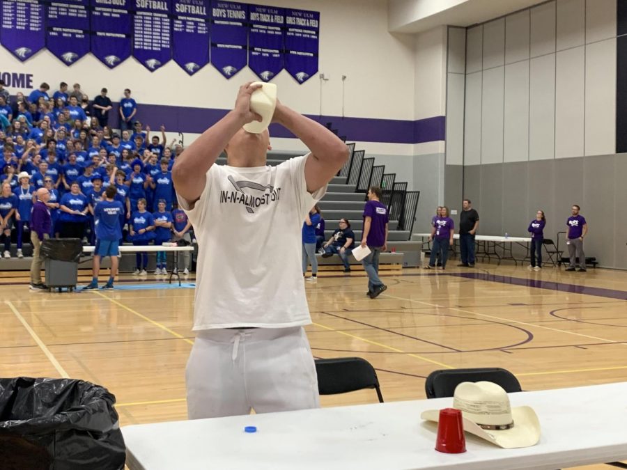 Junior Jared Beranek drinks half a gallon of milk during the milk chugging contest. Jared took first place for the juniors. 