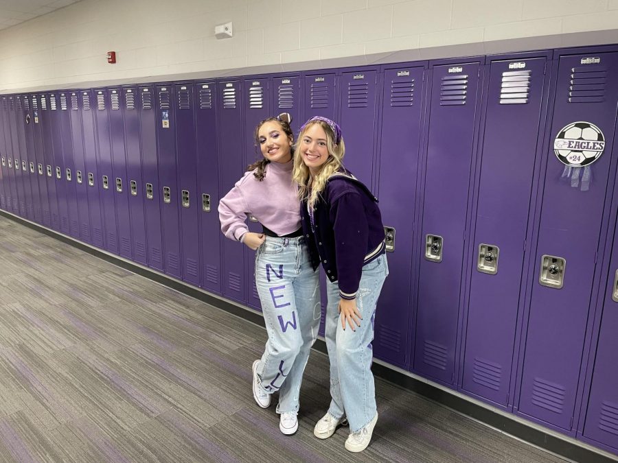NUHS Sophomores Alex Groebner and Sarah Todesco showing off their purple and white outfits.