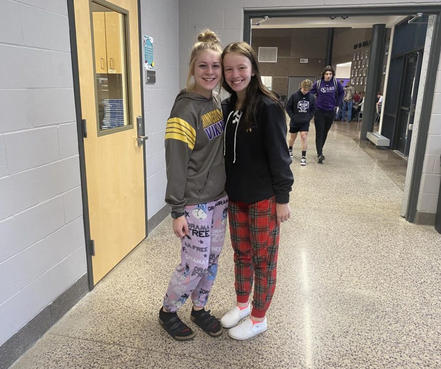 Senior Abbi Helget and Sophomore Chloe Geiger start off the week with their comfy pajamas for pajama day 