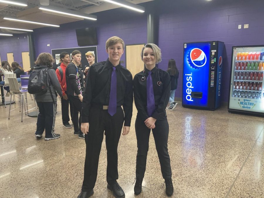 Two Students at NUHS dress up with suit and tie during the twins dress up day
