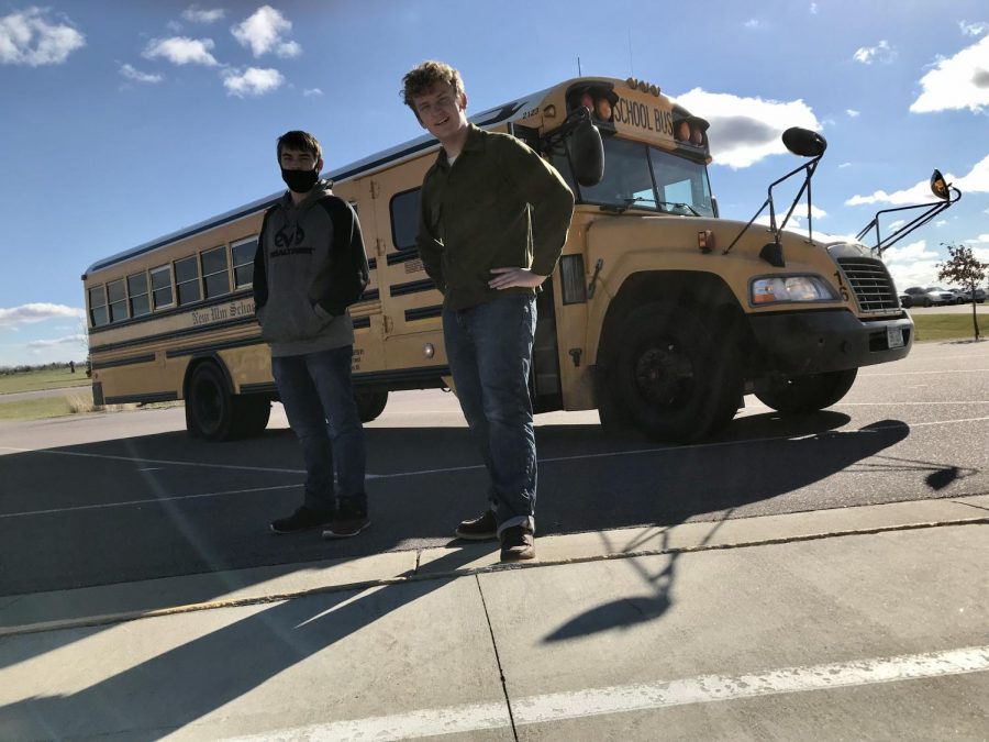 students from the intro to trades class board a bus for a trades fair in mankato