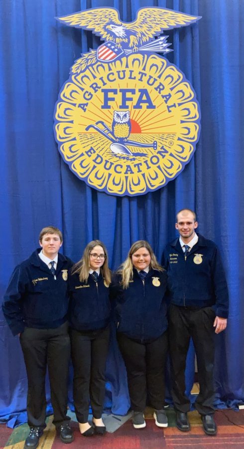 NUHS students Tyler Sondag, Andrew Hellendrung, Sam Schwab, and Allie Schwab posing for a pick at FFA National Convention   