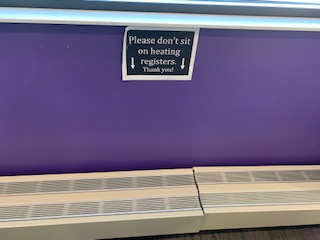 Students are not allowed to sit on the heaters.  