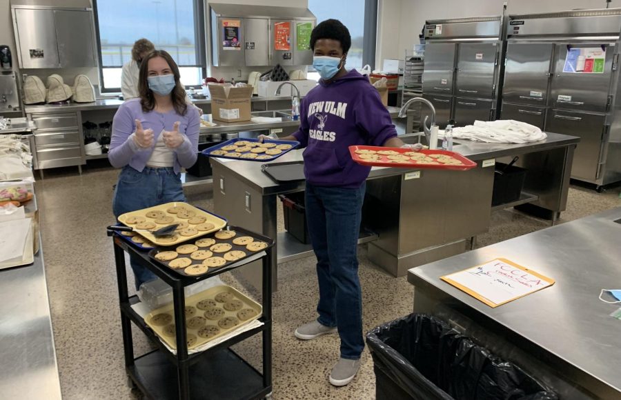 Seniors Asia Stade and Marcarious Amoah are baking cookies for the FCCLA Cookie Fundraiser in Mrs. Christians room during lunch. Its a delicious way to support FCCLA, Amoah said.