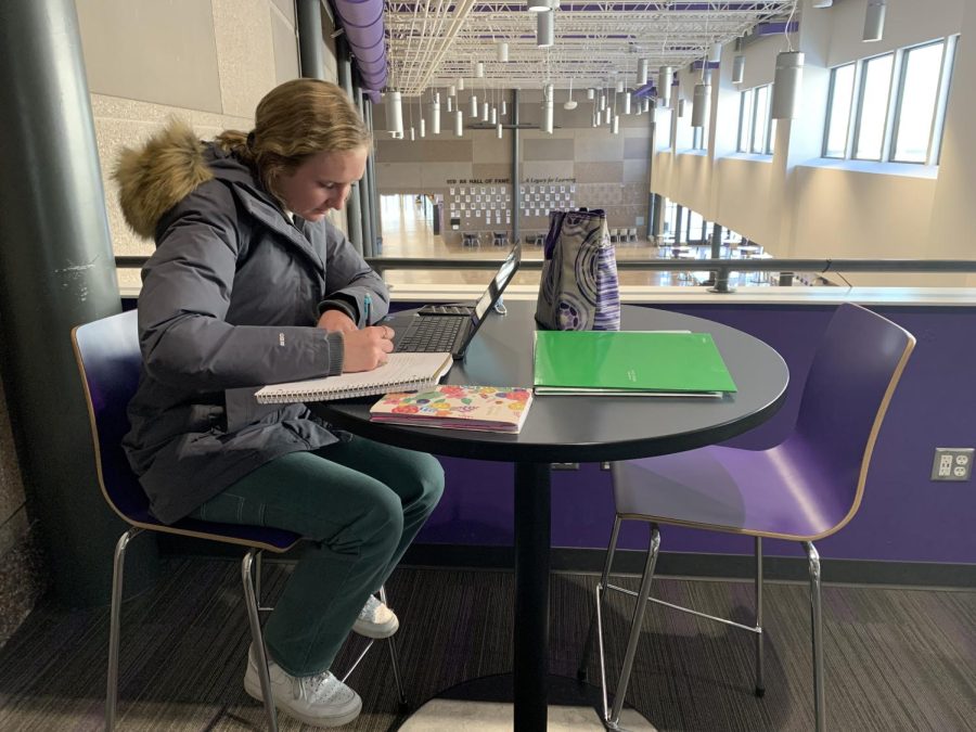 Senior Natalie Yackley using her open hour to catch up on some work in the upper commons. Here at NUHS, for so many college credits you earn, you get the advantage of an open hour. The upper commons is a place students are allowed to utilize when they need to complete work, often for tutors too. Yackley said, I like my open hour because it gives me time to focus on certain things. 
