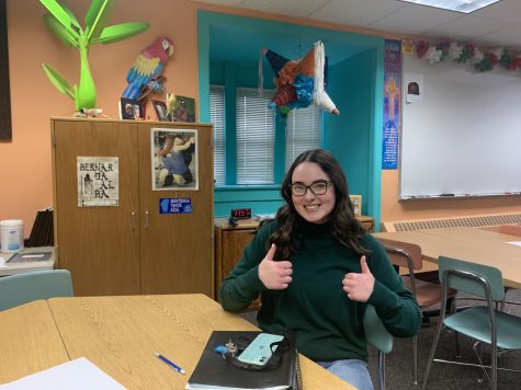 Senior Marissa Todesco smiling because she got her essay questions done before class. 