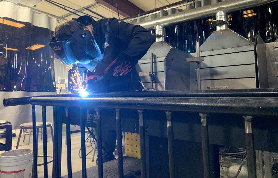 Down at the CTE Center recently, Jaden Miller has been welding up bike racks for Eagle Enterprise.  