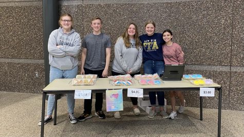 During lunch on May 9th, Minne Sugar surprised students with delicious cookies! A variety of individually wrapped cookies were sold from $3- to a pack of two for $5. The proceeds are being put towards the NUHS choir and band Valley Fair trip this May. 
