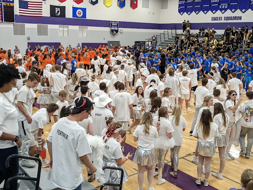 The end of battle of the classes, with everyone filing out of the gym after the Juniors stand tall, followed by the Seniors, Sophomores, and Freshmen.