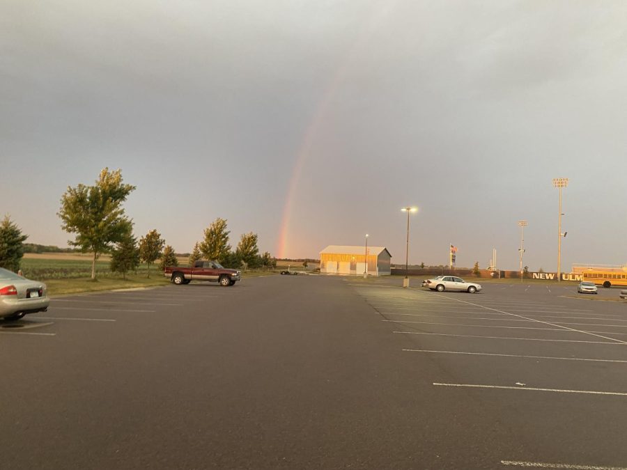 A photogenic rainbow before an early morning shower at the high school.