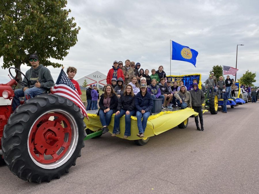 A second FFA float was pulled in the homecoming parade on Friday, September 23rd. The float was pulled by a Farmall tractor provided by and driven by Broddy Enter.
