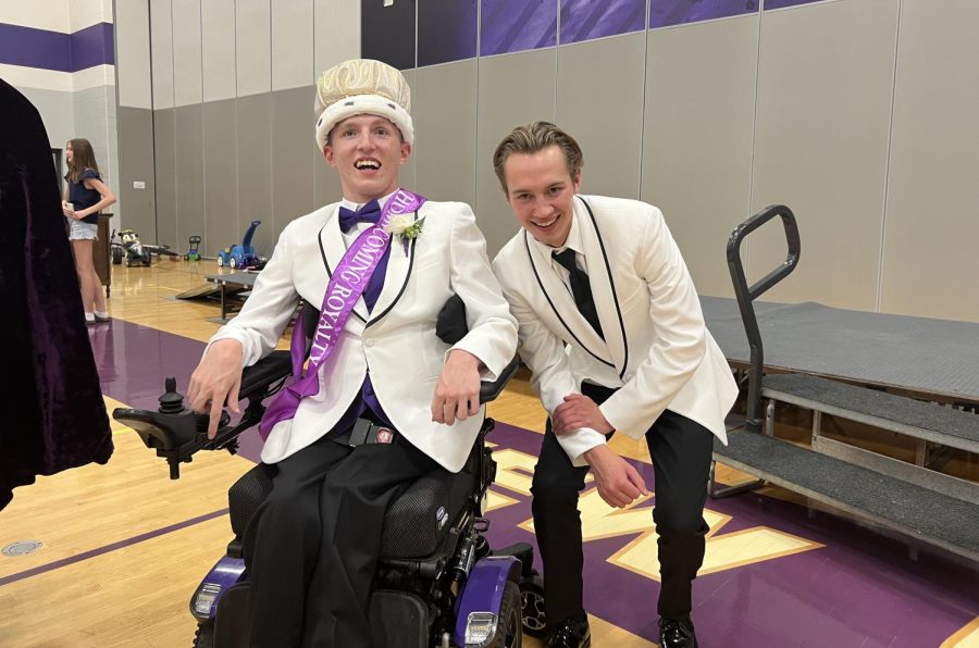 Cale Dennis poses next to Homecoming King, Carson Lewis.Cale Dennis served as Lewiss back-up dancer for the annual Homecoming Court dance at Coronation on Monday, September 19.