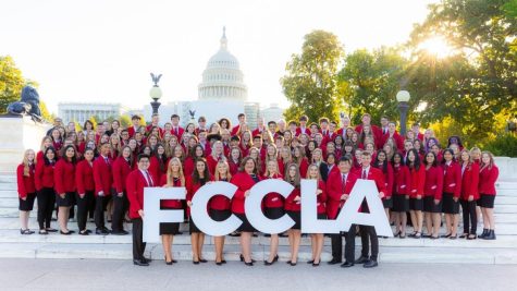 FCCLA members at Capitol Leadership pose for a photo outside the U.S. Capitol. New Ulms Nathaniel Janssen is in the front row on the far right.