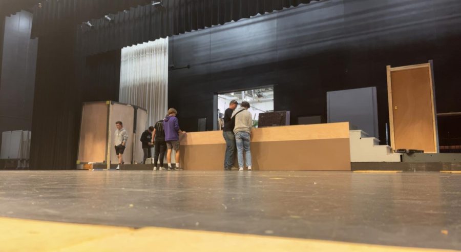 Students plan out what to build on the set of the upcoming NUHS musical The Addams Family
