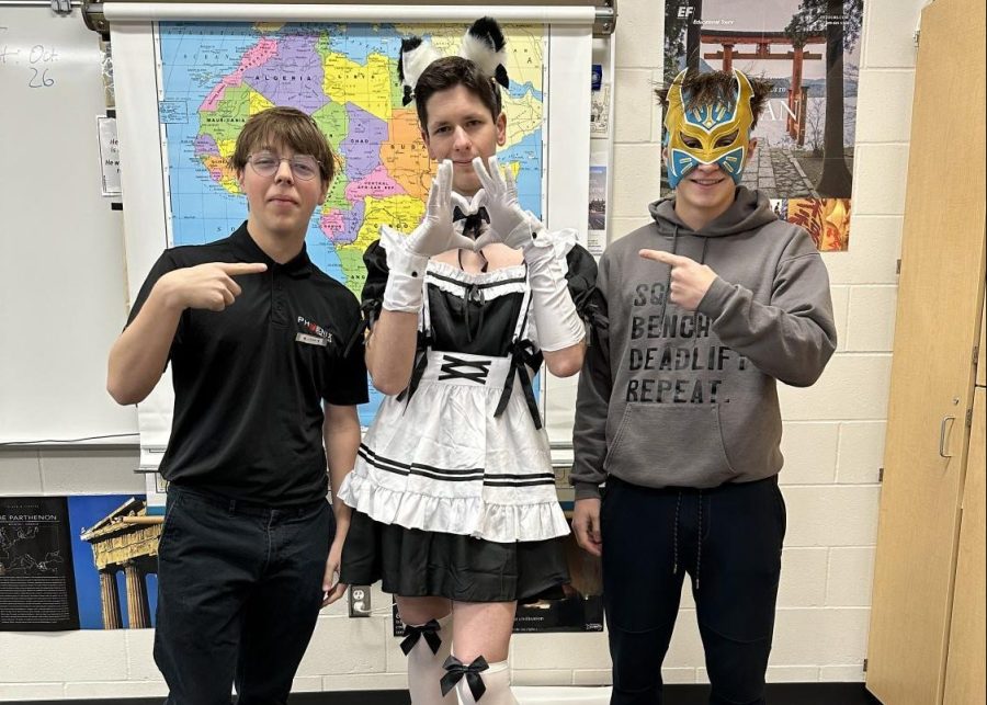 Dylan Jackson (Dressed as Logan Wick) , Cole Fortwengler (Dressed as a maid), and Ben Brownfield (Dressed as Sin Cara from WWE) pose for a snazzy picture!