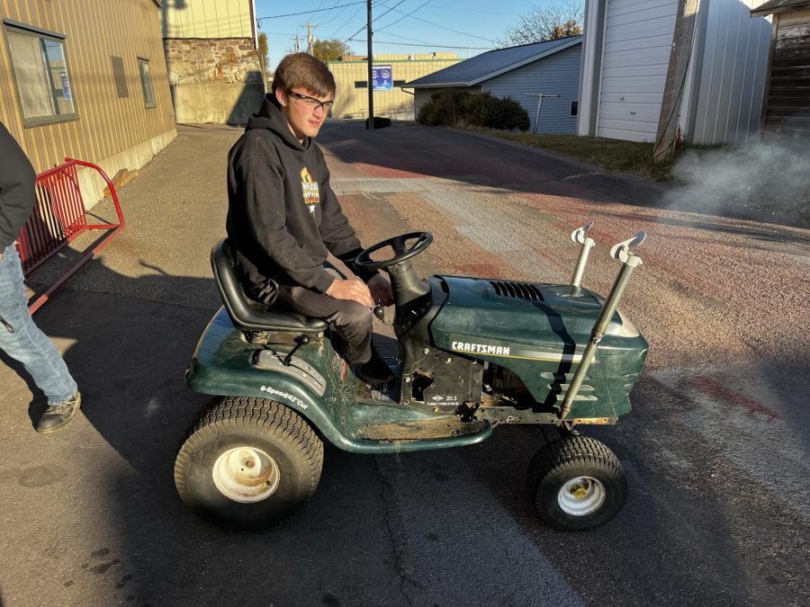 Jonathan Wolkow and his recently modified lawnmower.