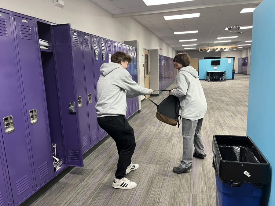 Senior Johnny McSchool ambushes freshmen in the hallway before classes start.