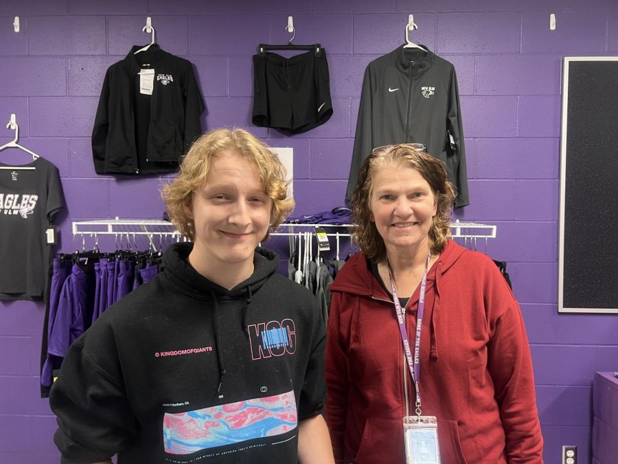 Ms. Mosher (right) and Jayden Ludwig (left) pose in the school store.