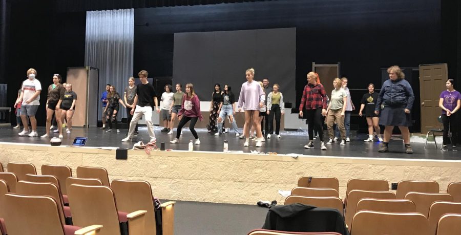 Theater members working on choreography for the musical.