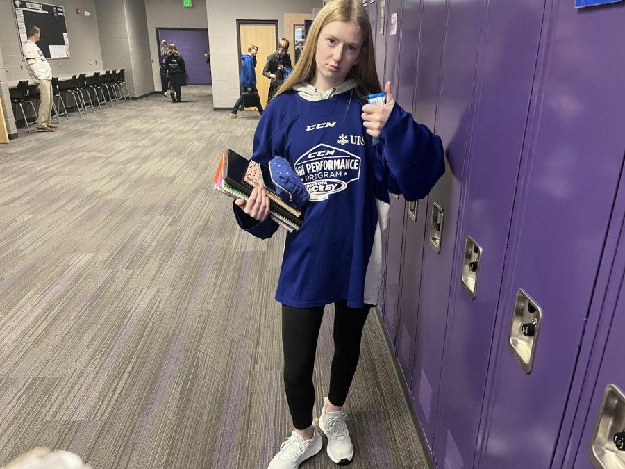 Senior Karson Schmid dressed in her hockey jersey for the second day of American Education Week.