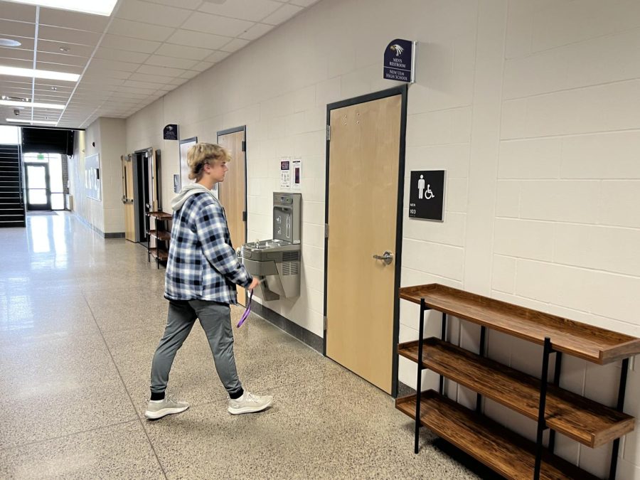 Senior Leo Waloch goes to the bathroom with a physical hall pass during class.