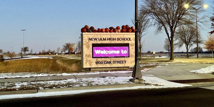 On a cold November morning, students discover the schools sign covered with pumpkins from a prankster. 