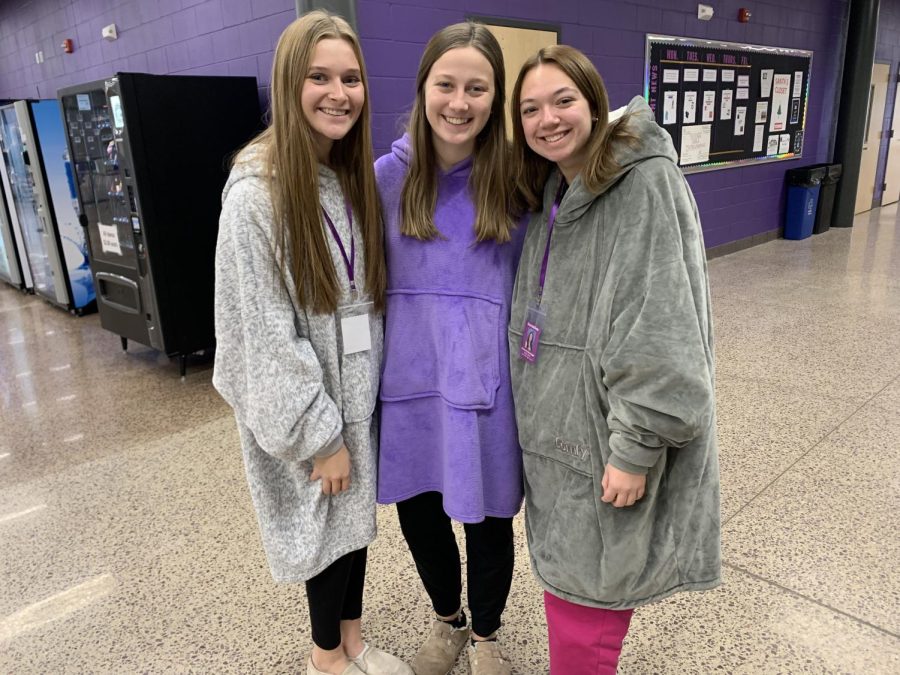 Seniors Bryanna Aschenbrenner, Leigha Grussendorf, and Emerson Wenninger (left to right) dress up for comfy day