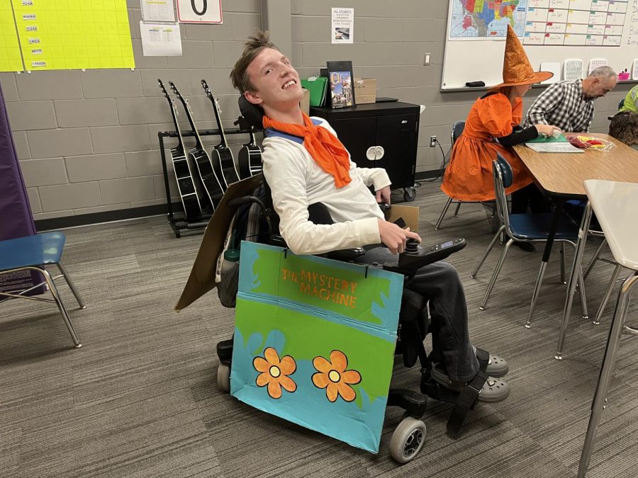 Carson Lewis rocks his wheels by dressing up as Fred and the Mystery Machine from Scooby Doo.