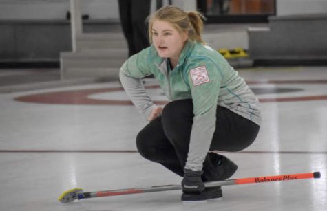 Mackenzie Page watching her rock,  communicating to the sweepers at St. Paul Curling Club, Womens Cash Spiel during the 2018-2019 season. 