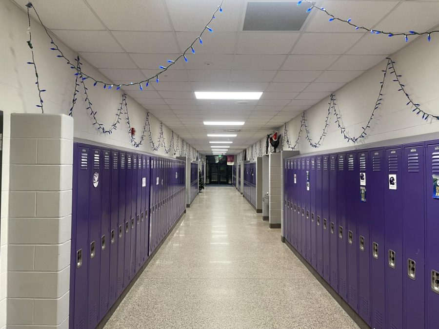 Christmas lights strung up corner to corner in the AG hallway at NUHS.