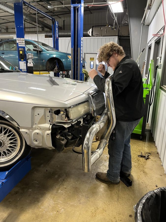 Student Ethan Dake is tired of moose running out in front of him and messing up his beloved 1997 lincoln town car. At the New Ulm CTE center on Wednesday afternoon, he decided to install a moose bumper from a semi. “Im gonna hit soooo many mooses,” Ethan says. Ethan is now excited that his car will no longer get damaged.