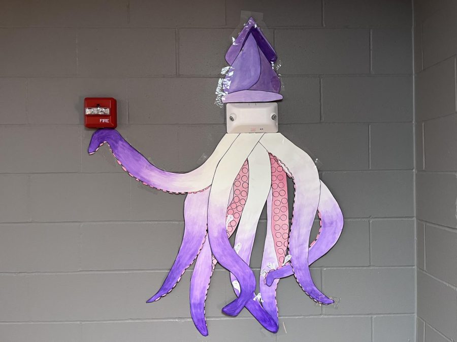 Seniors Bryn Nesvold and Addison Haynes constructed this purple squid for their Installation Project in Advanced Art. The Installation Project highlights different techniques such as graffiti, and turning random boring objects into an exciting and entertaining craft!  