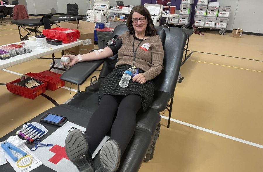 Ms.Filzen giving blood at the local blood drive at the New Ulm Highschool.
