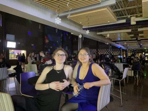 Estafania Montolvo and Daisy Hennrichs taking a break from dancing at the NUHS semi formal.