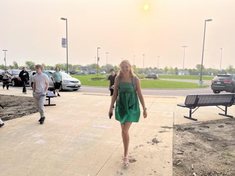 Senior Emerson Wenninger walking into school for the last time as a NUHS student