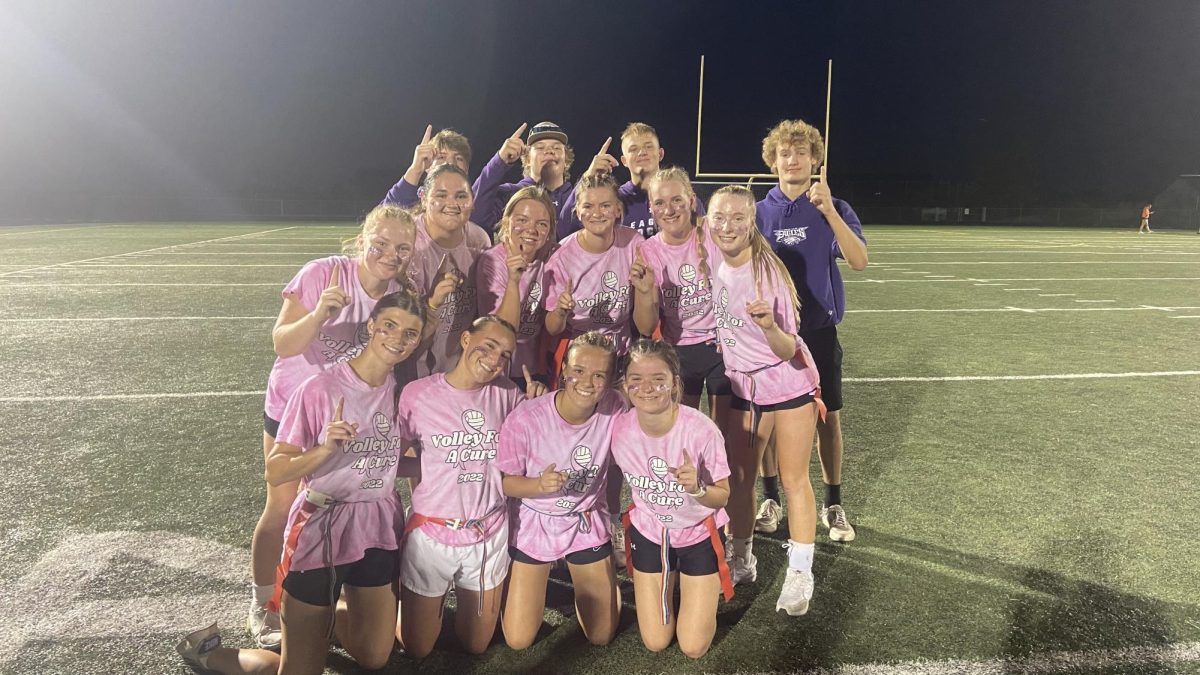 Wednesday, September 20, NUHS Junior class poses for a picture after winning the powder puff game on the high school football field. Student coaches (left to right), Brody Hacker, Hunter Lewandowski, Ian Brudelie, and Preston Holberg lead the girls to a 16-6 victory, upsetting the Seniors. 