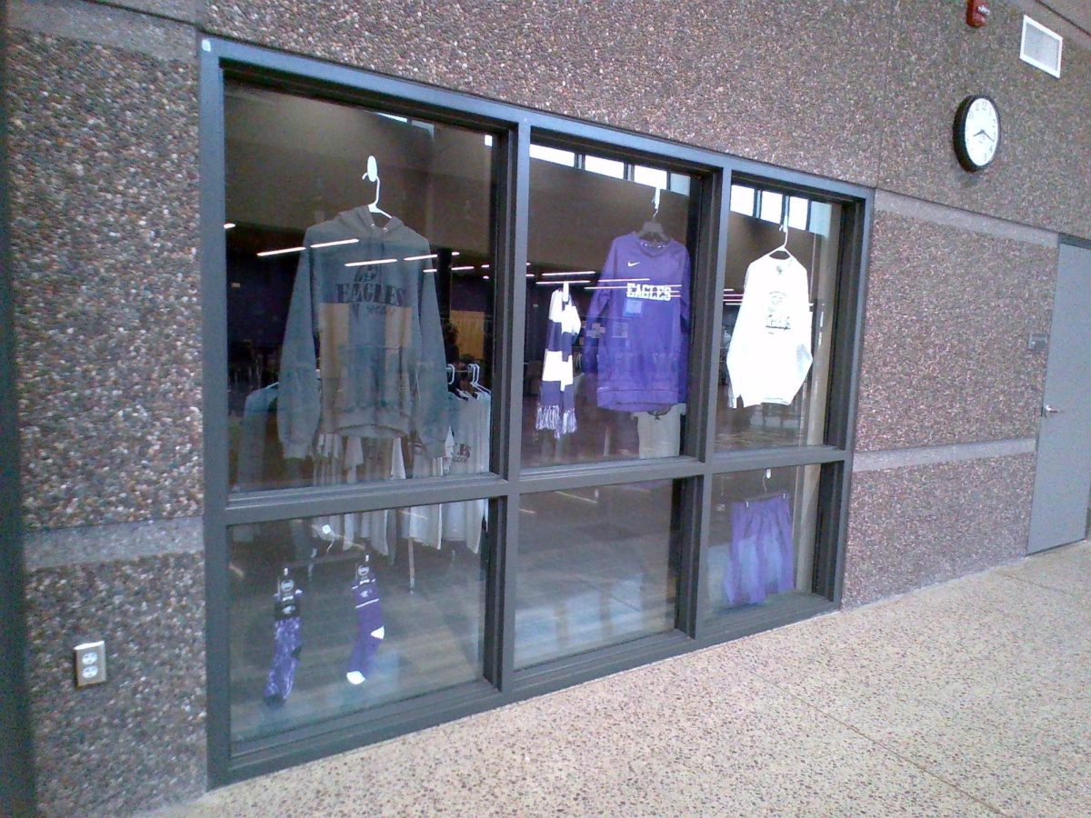 The school store displaying products in the window for the students to view. 