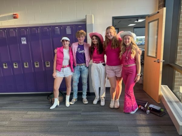 Wednesday, Sept. 20, some juniors pose for a picture in the halls of NUHS to show off their fit for Barbie vs. Ken day.