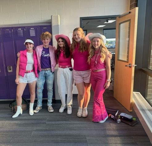 Wednesday, Sept. 20, some juniors pose for a picture in the halls of NUHS to show off their fit for Barbie vs. Ken day.