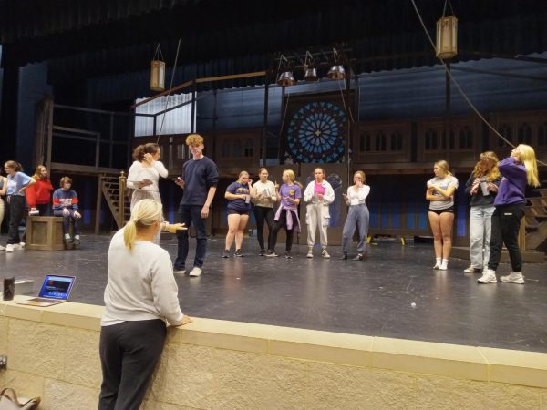Students practicing new choreography in preparation for the musical Hunchback of Notre Dame.