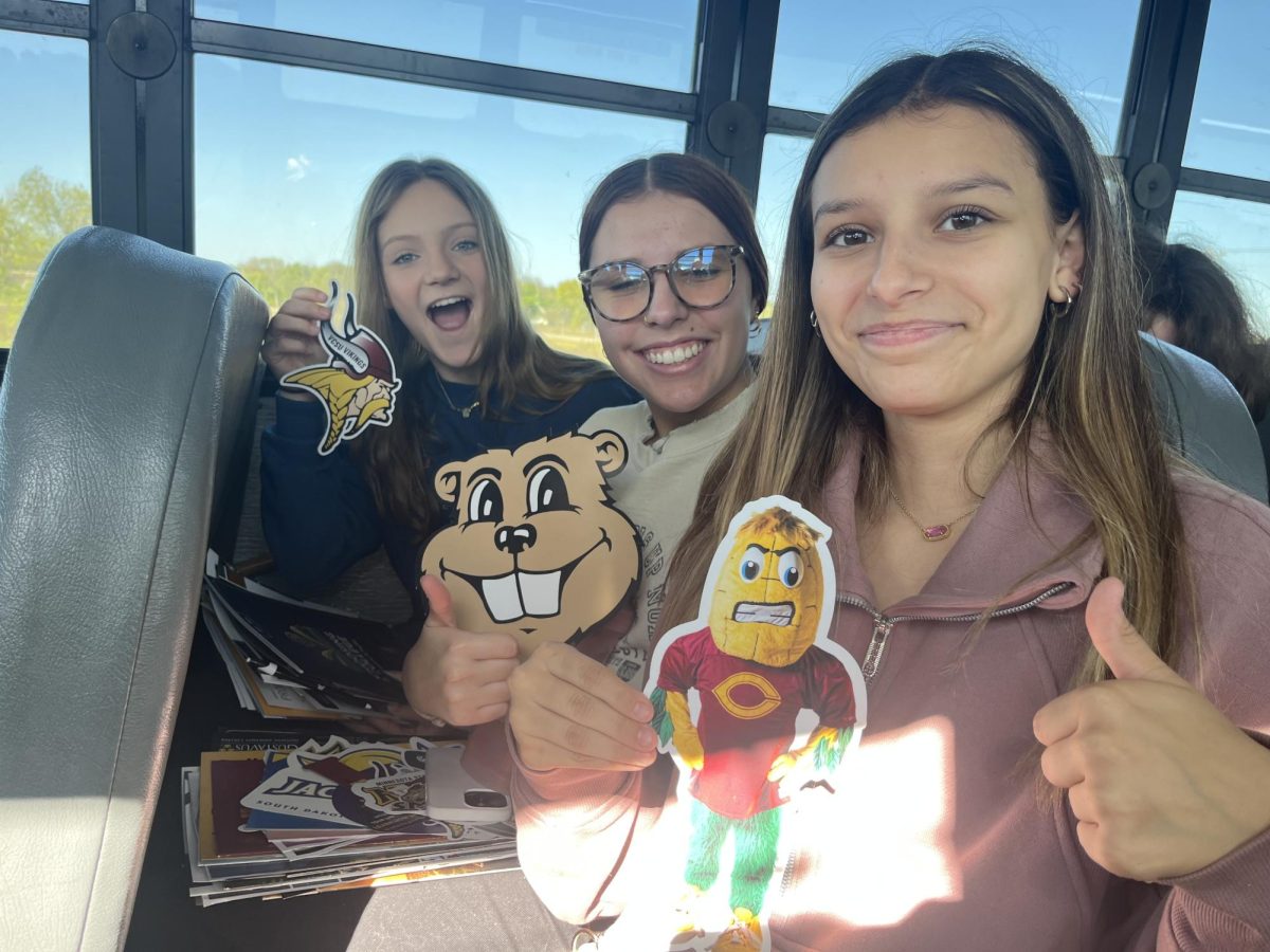 NUHS Juniors Addie Ringhofer (left), Payton Fluegge, and Jasmin Huerta enjoy the ride back to New Ulm after the MSU College Fair.