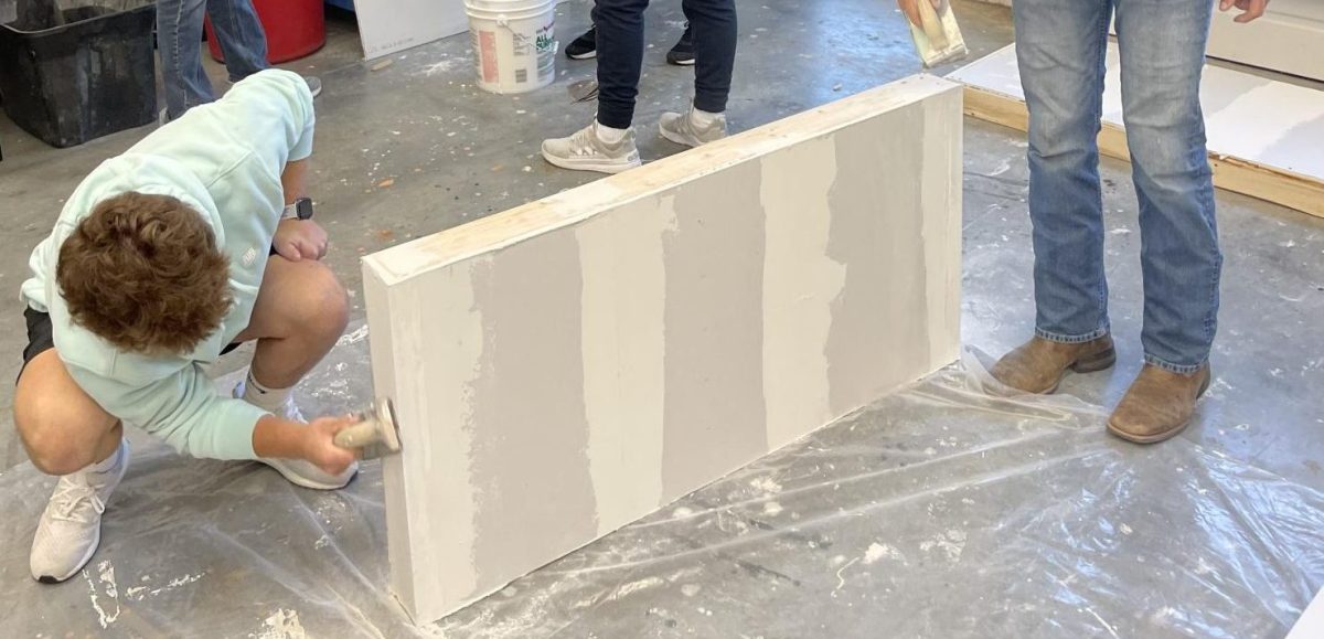 The NUHS residental maintenance class is learning how to drywall. Junior Tegan Kral said, I think it looks pretty good for our first time, Im pretty proud of our group. The class is learning everything from framing a wall to actually applying drywall and mud. 