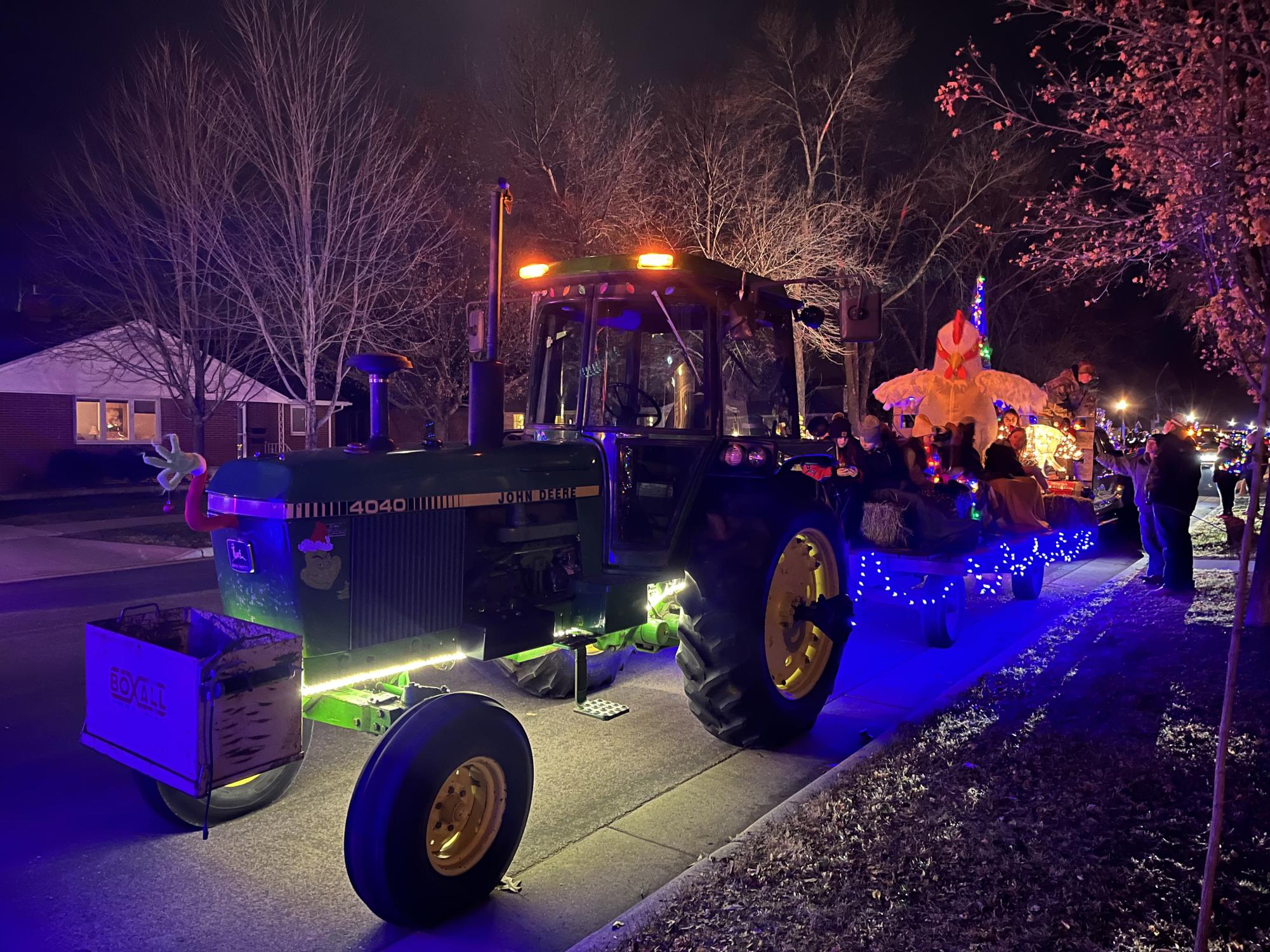 The second tractor and float in the parade driven by Kolbe Platz.