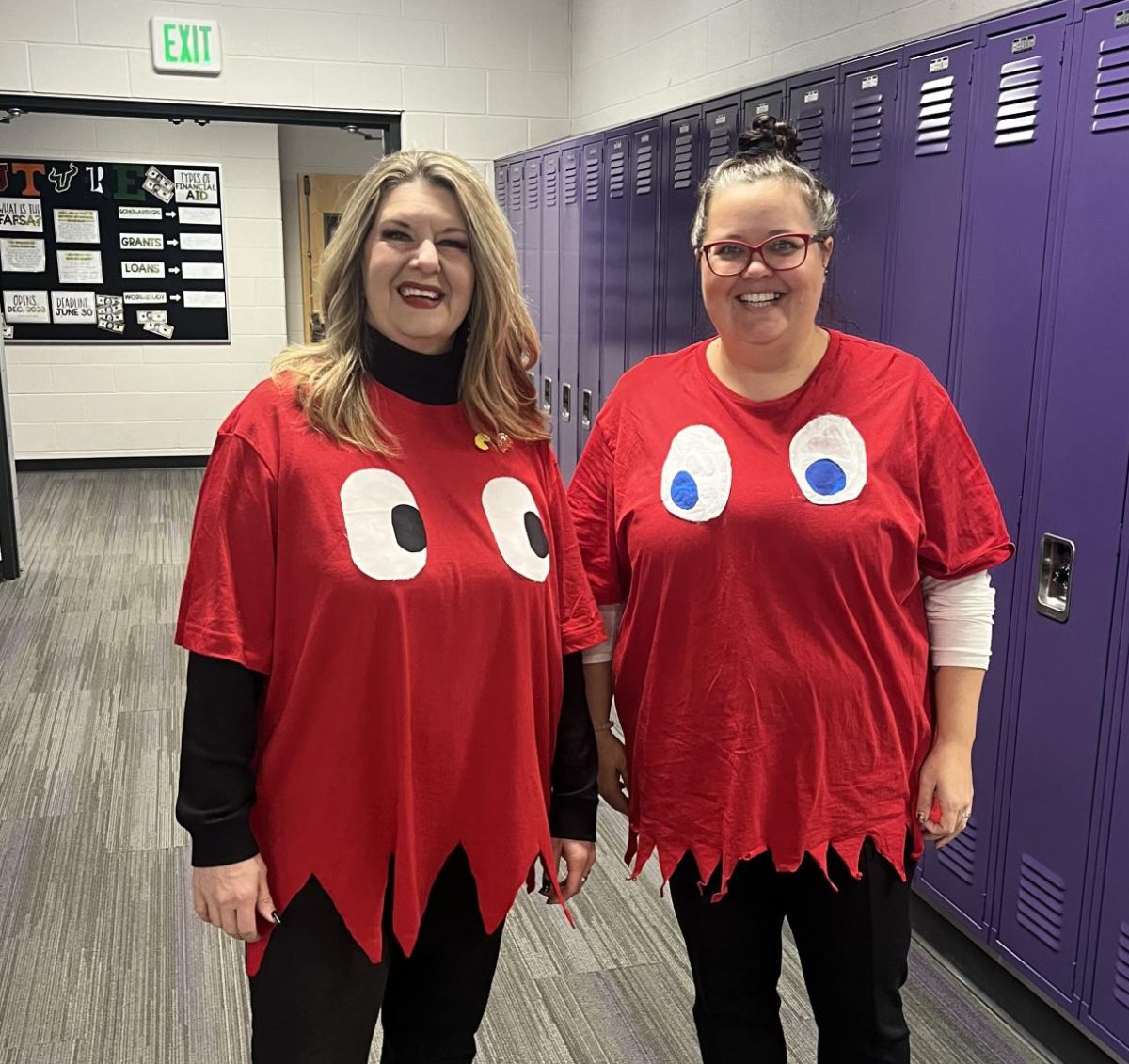 English teacher Mrs. Nelson (left) and  para Erin Altmann dress up as pac man characters for Halloween!
